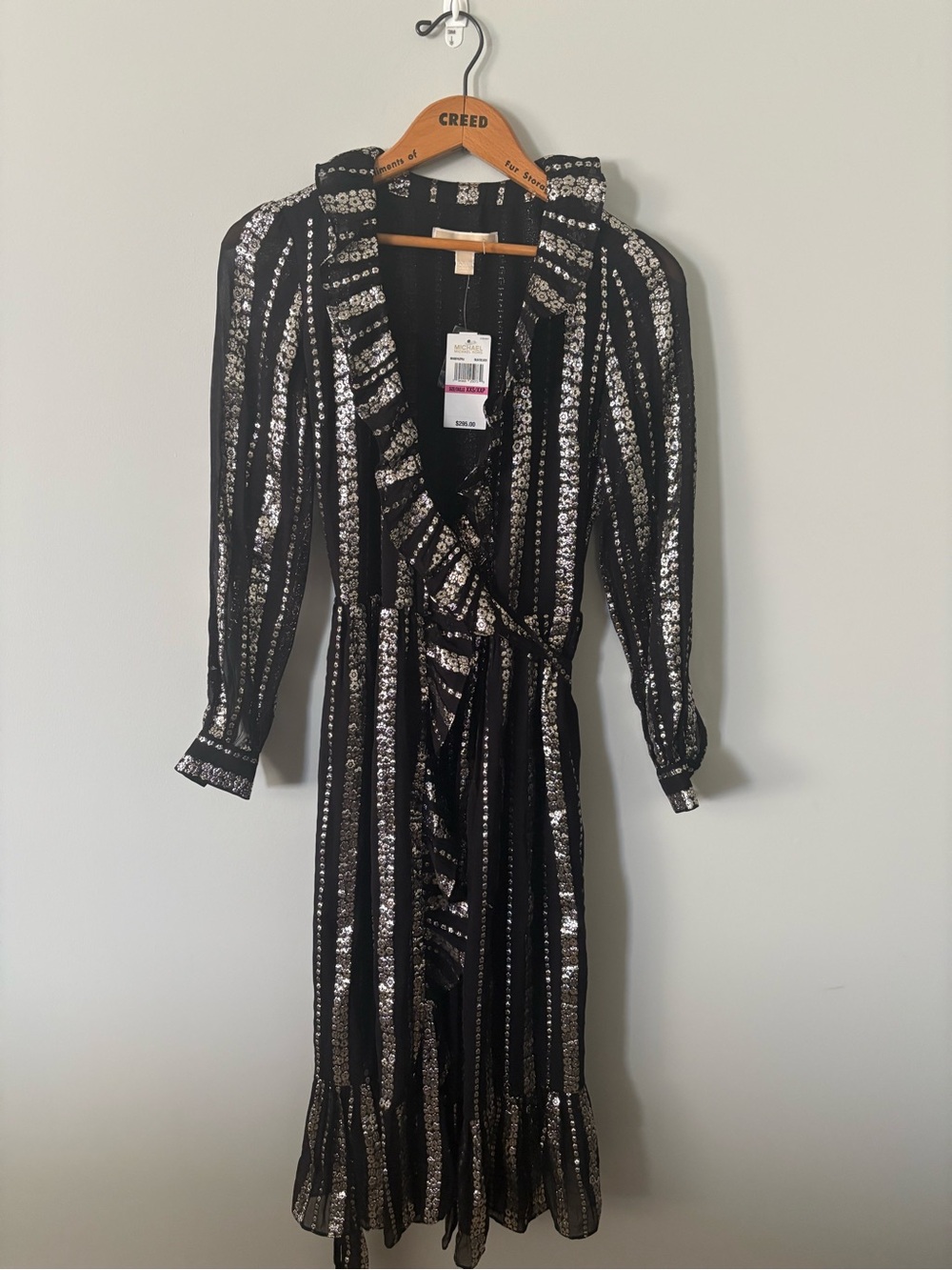 Michael Kors black wrap dress with silver metallic floral stripes